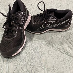 Black Asics running shoes